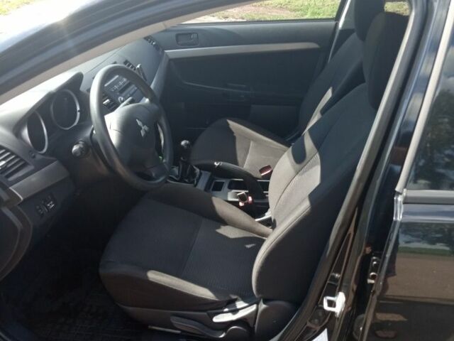 Мицубиси Лансер 2009 в Бобровице на Automoto.ua Черный Мицубиси Лансер, объемом двигателя 1.5 л и пробегом 156 тыс. км за 6700 $, фото 6 на Automoto.ua