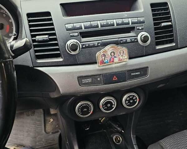 Чорний Міцубісі Lancer, об'ємом двигуна 2 л та пробігом 214 тис. км за 5900 $, фото 9 на Automoto.ua