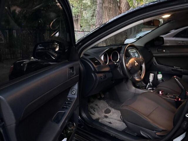 Чорний Міцубісі Lancer, об'ємом двигуна 2 л та пробігом 253 тис. км за 7300 $, фото 9 на Automoto.ua
