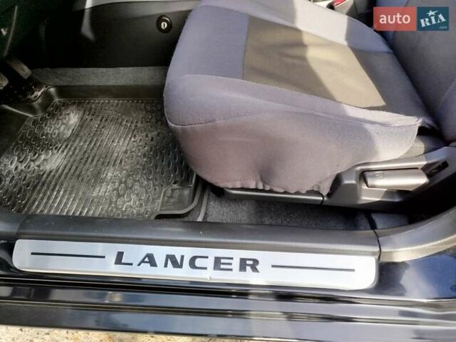 Черный Мицубиси Лансер, объемом двигателя 1.58 л и пробегом 78 тыс. км за 6500 $, фото 27 на Automoto.ua