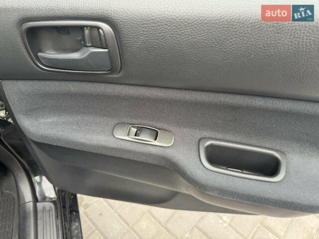 Чорний Міцубісі Lancer, об'ємом двигуна 1.58 л та пробігом 128 тис. км за 5999 $, фото 22 на Automoto.ua