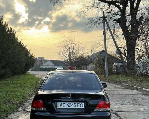 Чорний Міцубісі Lancer, об'ємом двигуна 1.6 л та пробігом 98 тис. км за 5600 $, фото 2 на Automoto.ua