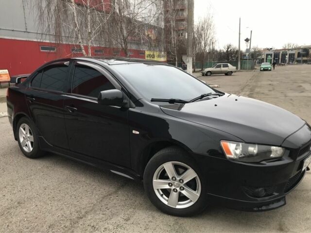 Чорний Міцубісі Lancer, об'ємом двигуна 2 л та пробігом 215 тис. км за 7750 $, фото 13 на Automoto.ua