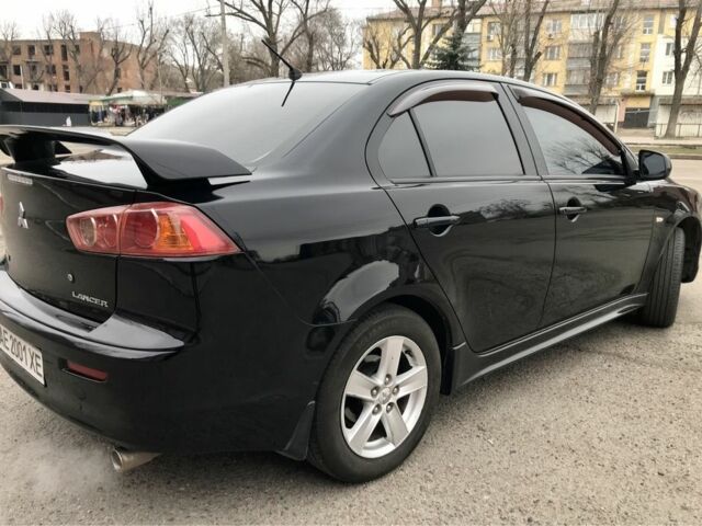 Чорний Міцубісі Lancer, об'ємом двигуна 2 л та пробігом 215 тис. км за 7750 $, фото 14 на Automoto.ua