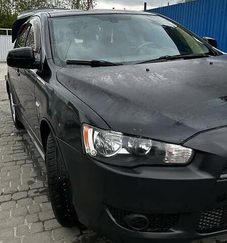 Чорний Міцубісі Lancer, об'ємом двигуна 2 л та пробігом 234 тис. км за 6750 $, фото 5 на Automoto.ua