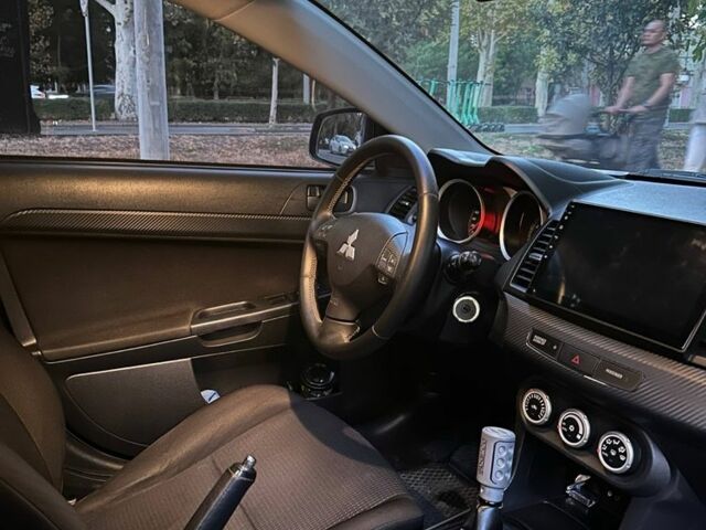 Чорний Міцубісі Lancer, об'ємом двигуна 2 л та пробігом 253 тис. км за 7300 $, фото 13 на Automoto.ua