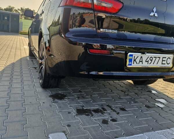 Чорний Міцубісі Lancer, об'ємом двигуна 2 л та пробігом 183 тис. км за 7200 $, фото 11 на Automoto.ua