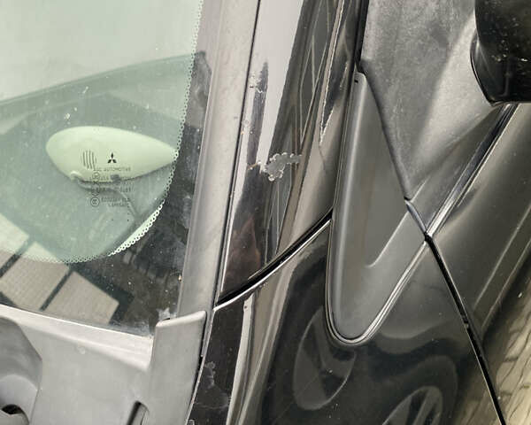 Чорний Міцубісі Lancer, об'ємом двигуна 1.58 л та пробігом 287 тис. км за 4750 $, фото 13 на Automoto.ua