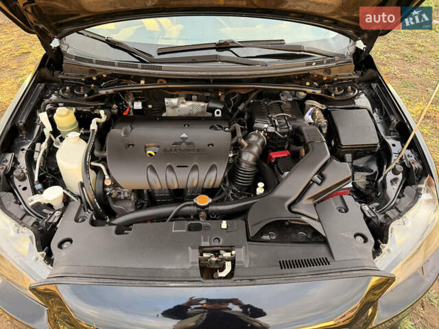 Чорний Міцубісі Lancer, об'ємом двигуна 2 л та пробігом 204 тис. км за 7500 $, фото 9 на Automoto.ua