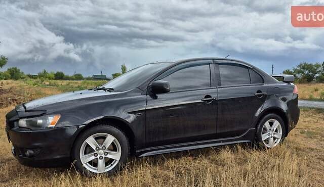 Чорний Міцубісі Lancer, об'ємом двигуна 2 л та пробігом 230 тис. км за 6800 $, фото 3 на Automoto.ua