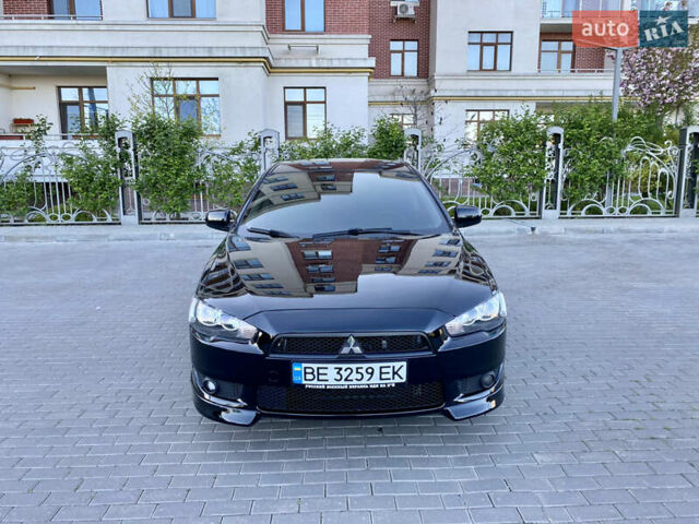 Мицубиси Лансер 2009 в Одессе на Automoto.ua Черный Мицубиси Лансер, объемом двигателя 2 л и пробегом 197 тыс. км за 7250 $, фото 7 на Automoto.ua