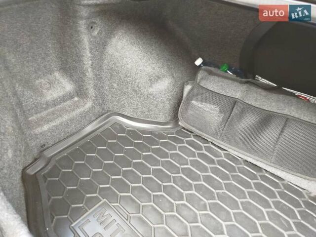 Черный Мицубиси Лансер, объемом двигателя 1.58 л и пробегом 78 тыс. км за 6500 $, фото 17 на Automoto.ua