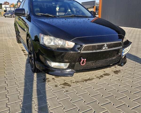 Чорний Міцубісі Lancer, об'ємом двигуна 2 л та пробігом 183 тис. км за 7200 $, фото 7 на Automoto.ua