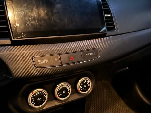 Чорний Міцубісі Lancer, об'ємом двигуна 2 л та пробігом 253 тис. км за 7300 $, фото 11 на Automoto.ua