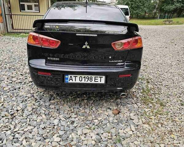 Чорний Міцубісі Lancer, об'ємом двигуна 2 л та пробігом 214 тис. км за 5900 $, фото 10 на Automoto.ua