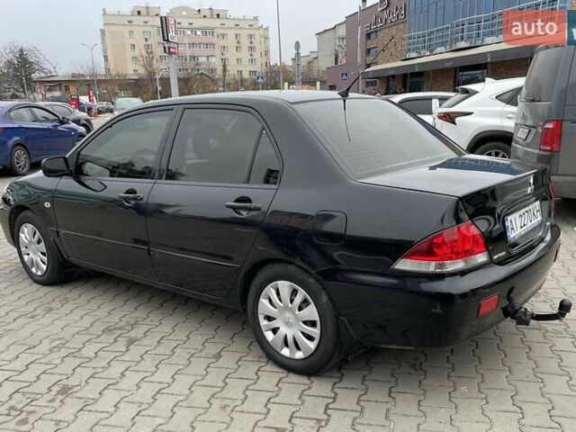 Чорний Міцубісі Lancer, об'ємом двигуна 1.6 л та пробігом 186 тис. км за 5500 $, фото 2 на Automoto.ua