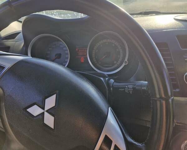 Чорний Міцубісі Lancer, об'ємом двигуна 2 л та пробігом 183 тис. км за 7200 $, фото 15 на Automoto.ua