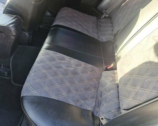 Черный Мицубиси Лансер, объемом двигателя 2 л и пробегом 184 тыс. км за 6999 $, фото 15 на Automoto.ua