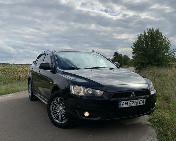 Чорний Міцубісі Lancer, об'ємом двигуна 2 л та пробігом 200 тис. км за 7200 $, фото 3 на Automoto.ua