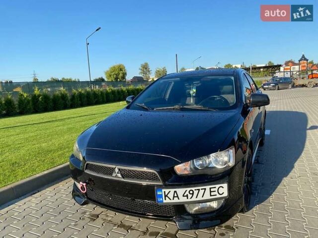 Чорний Міцубісі Lancer, об'ємом двигуна 2 л та пробігом 183 тис. км за 7200 $, фото 4 на Automoto.ua