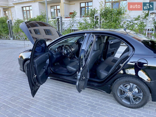 Мицубиси Лансер 2009 в Одессе на Automoto.ua Черный Мицубиси Лансер, объемом двигателя 2 л и пробегом 197 тыс. км за 7250 $, фото 27 на Automoto.ua
