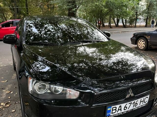 Чорний Міцубісі Lancer, об'ємом двигуна 2 л та пробігом 253 тис. км за 7300 $, фото 1 на Automoto.ua