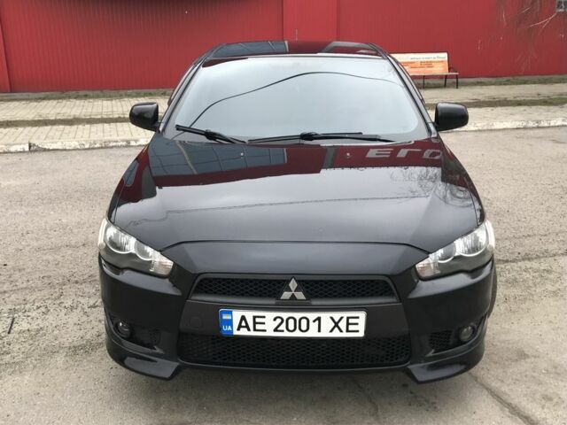 Чорний Міцубісі Lancer, об'ємом двигуна 2 л та пробігом 215 тис. км за 7750 $, фото 1 на Automoto.ua