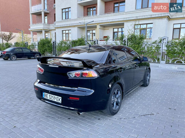 Мицубиси Лансер 2009 в Одессе на Automoto.ua Черный Мицубиси Лансер, объемом двигателя 2 л и пробегом 197 тыс. км за 7250 $, фото 19 на Automoto.ua