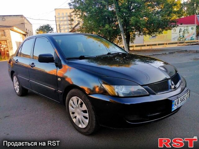 Чорний Міцубісі Lancer, об'ємом двигуна 1.6 л та пробігом 296 тис. км за 3650 $, фото 4 на Automoto.ua