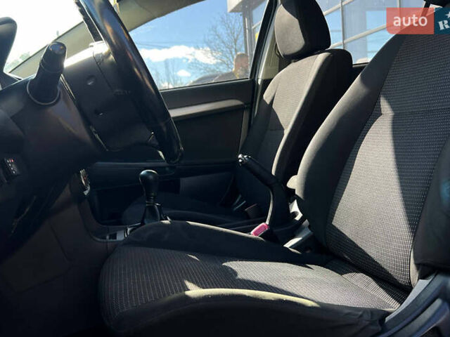 Черный Мицубиси Лансер, объемом двигателя 2 л и пробегом 215 тыс. км за 7000 $, фото 8 на Automoto.ua