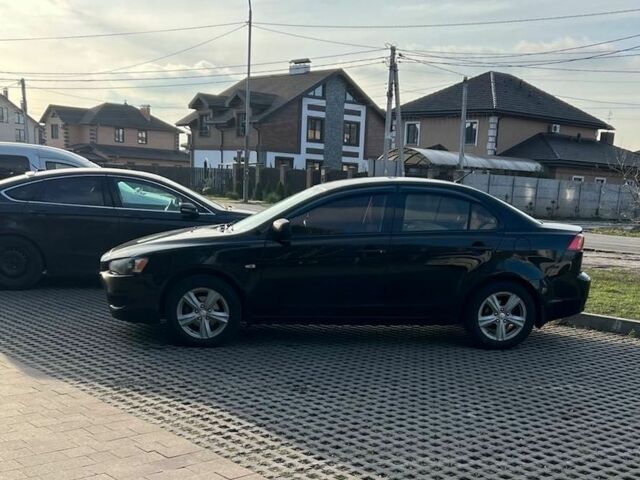 Чорний Міцубісі Lancer, об'ємом двигуна 0.15 л та пробігом 176 тис. км за 7899 $, фото 3 на Automoto.ua