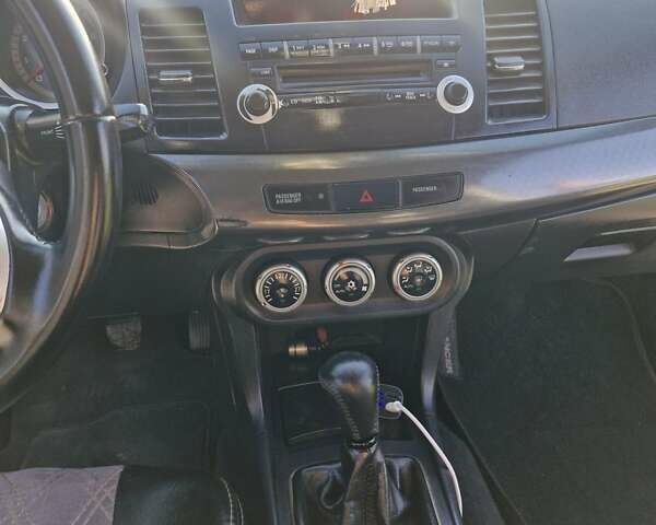 Чорний Міцубісі Lancer, об'ємом двигуна 2 л та пробігом 183 тис. км за 7200 $, фото 19 на Automoto.ua
