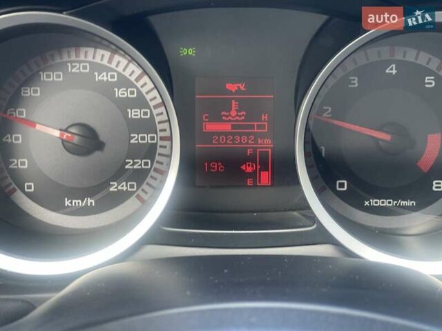 Черный Мицубиси Лансер, объемом двигателя 2 л и пробегом 201 тыс. км за 7000 $, фото 9 на Automoto.ua