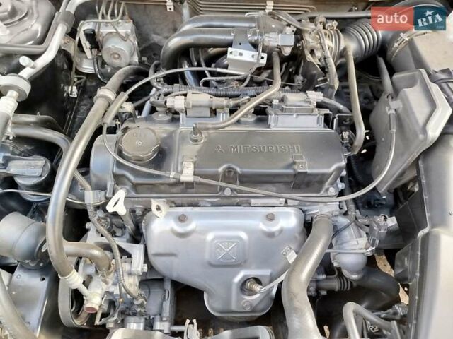 Черный Мицубиси Лансер, объемом двигателя 1.58 л и пробегом 78 тыс. км за 6500 $, фото 13 на Automoto.ua