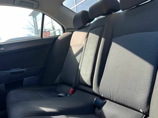 Черный Мицубиси Лансер, объемом двигателя 2 л и пробегом 215 тыс. км за 7000 $, фото 15 на Automoto.ua