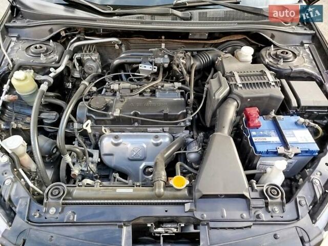 Черный Мицубиси Лансер, объемом двигателя 1.58 л и пробегом 78 тыс. км за 6500 $, фото 14 на Automoto.ua