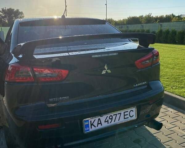 Чорний Міцубісі Lancer, об'ємом двигуна 2 л та пробігом 183 тис. км за 7200 $, фото 1 на Automoto.ua