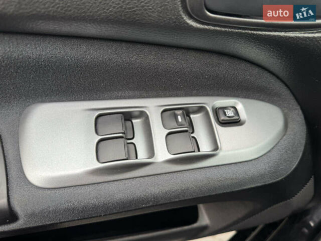 Чорний Міцубісі Lancer, об'ємом двигуна 1.58 л та пробігом 128 тис. км за 5999 $, фото 8 на Automoto.ua