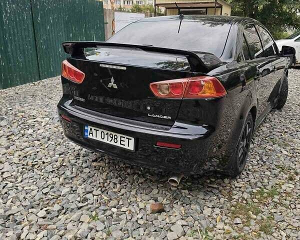 Чорний Міцубісі Lancer, об'ємом двигуна 2 л та пробігом 214 тис. км за 5900 $, фото 8 на Automoto.ua