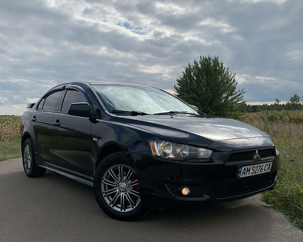 Чорний Міцубісі Lancer, об'ємом двигуна 2 л та пробігом 200 тис. км за 7200 $, фото 20 на Automoto.ua