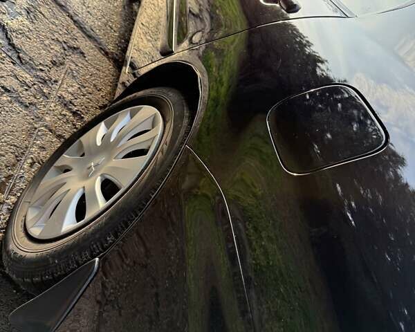 Чорний Міцубісі Lancer, об'ємом двигуна 1.6 л та пробігом 98 тис. км за 5600 $, фото 14 на Automoto.ua