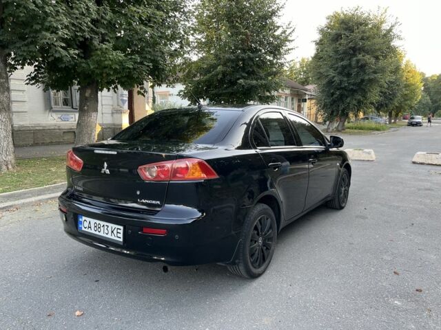Черный Мицубиси Лансер, объемом двигателя 1.5 л и пробегом 158 тыс. км за 5500 $, фото 6 на Automoto.ua