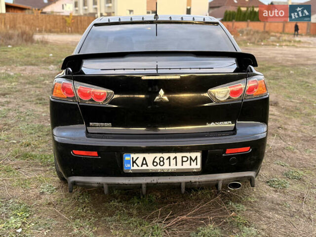 Чорний Міцубісі Lancer, об'ємом двигуна 2 л та пробігом 204 тис. км за 7500 $, фото 5 на Automoto.ua