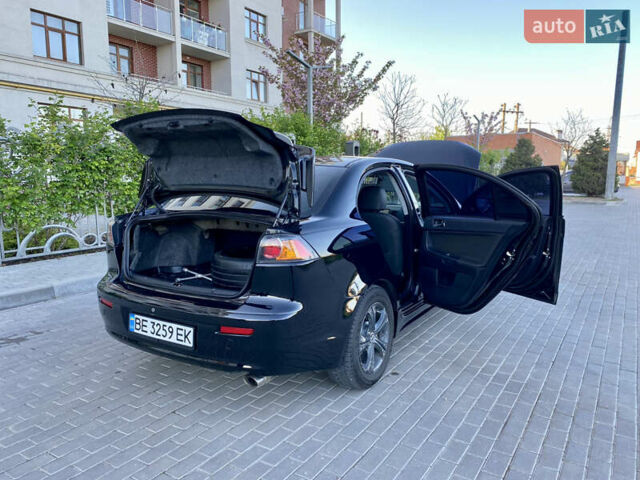 Мицубиси Лансер 2009 в Одессе на Automoto.ua Черный Мицубиси Лансер, объемом двигателя 2 л и пробегом 197 тыс. км за 7250 $, фото 54 на Automoto.ua