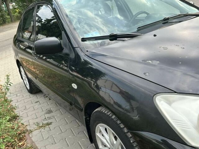 Чорний Міцубісі Lancer, об'ємом двигуна 0 л та пробігом 220 тис. км за 3000 $, фото 6 на Automoto.ua