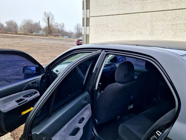 Чорний Міцубісі Lancer, об'ємом двигуна 1.6 л та пробігом 300 тис. км за 3500 $, фото 9 на Automoto.ua