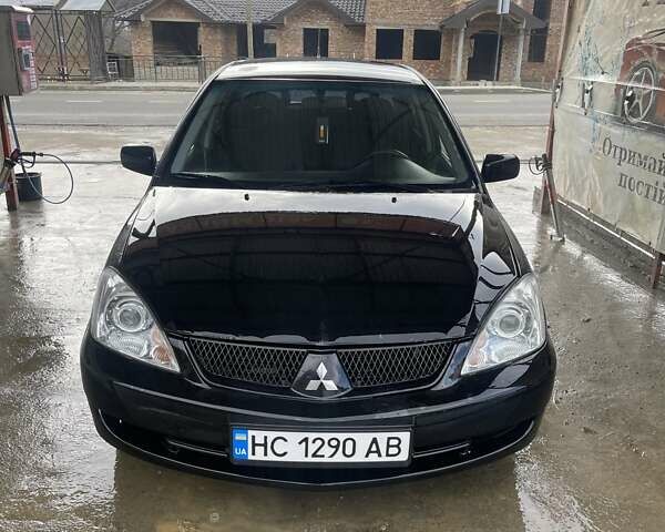 Чорний Міцубісі Lancer, об'ємом двигуна 1.59 л та пробігом 309 тис. км за 3900 $, фото 7 на Automoto.ua