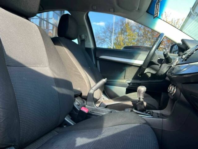 Черный Мицубиси Лансер, объемом двигателя 2 л и пробегом 215 тыс. км за 7000 $, фото 16 на Automoto.ua