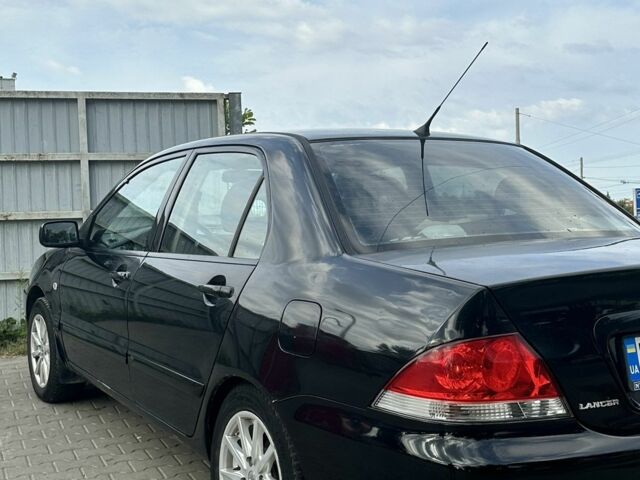 Чорний Міцубісі Lancer, об'ємом двигуна 0 л та пробігом 220 тис. км за 3000 $, фото 3 на Automoto.ua