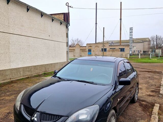 Чорний Міцубісі Lancer, об'ємом двигуна 1.6 л та пробігом 300 тис. км за 3500 $, фото 2 на Automoto.ua